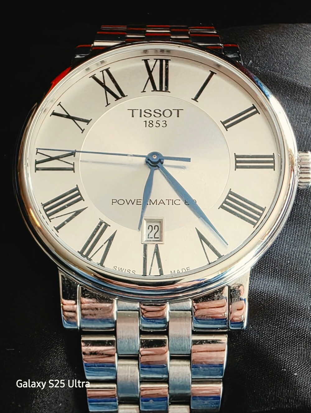 Tissot Silver Watch with Blue Hands and White Dial